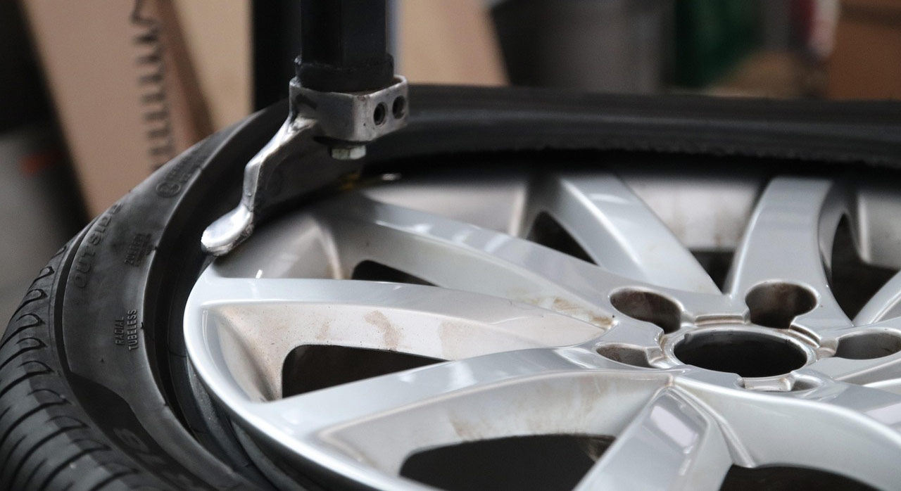 Tire being fitted